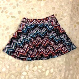 Rainbow chevron skirt with pockets.